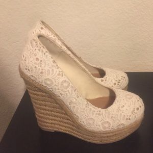 Size 6 white lace wedges. Never worn.