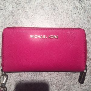 Fuschia michael Kors wristlet