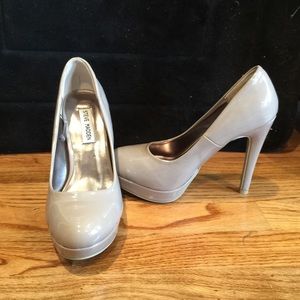 Nude closed toe platforms.