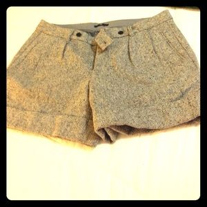 Gray and white work shorts.
