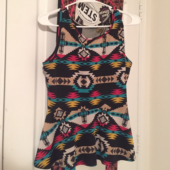 TRIBAL PRINT PEPLUM TOP 🐯