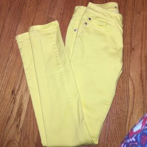 Bright yellow skinny jeans