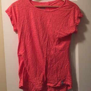 Coral workout shirt and circle cut out in back
