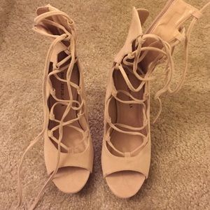 Nude tie up heels from Lola Shoe tique