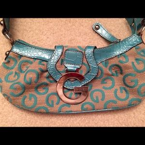 Super cute guess handbag.