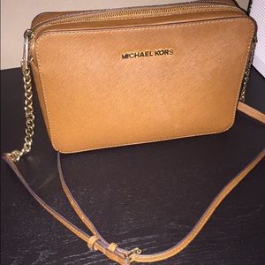 Luggage brown Michael Kors cross body purse