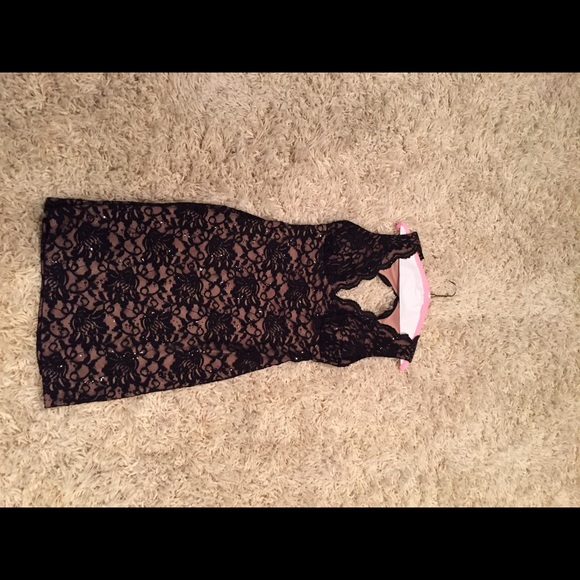 Size 11/12 Black cocktail dress. Worn one time.
