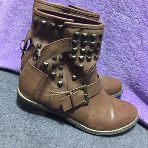 Studded tan boots with buckle on side
