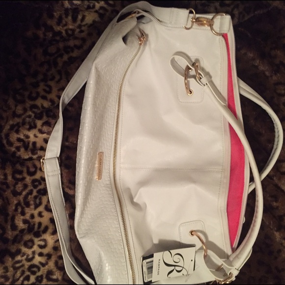 White, with pink interior Rampage Purse!