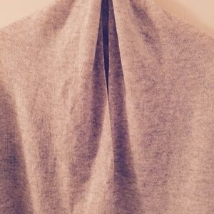 In asymmetrical cashmere shawl