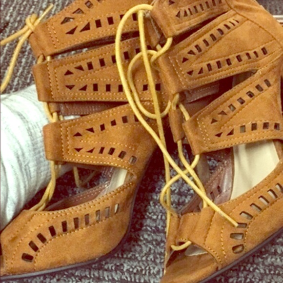 Brown suede laced heels