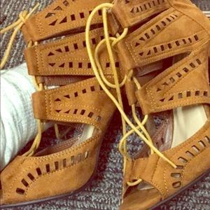 Brown suede laced heels