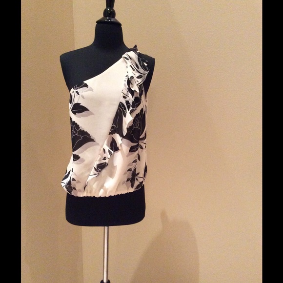 Bebe floral tan and black one shoulder shirt