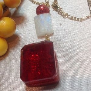 32 55.90Ct Certified red topaz with papers as seen