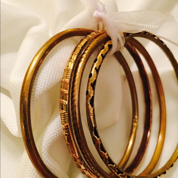 4 gold tone bracelets - Picture 2 of 4