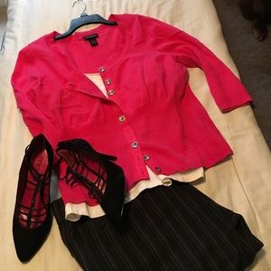 Hot pink cardigan.
