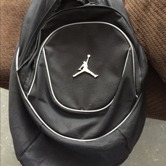 Black Jordan bookbag and pink pull over