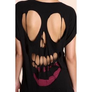 Plain black shirt with skull cutout on back
