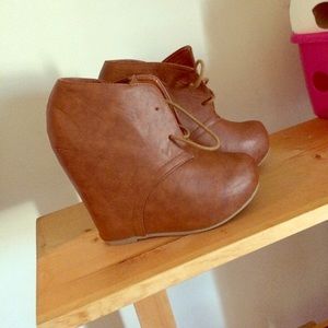 Brown wedge booties
