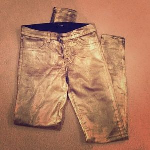 J Brand gold coated black super skinny jeans.