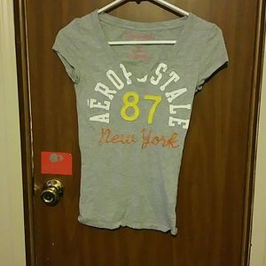 Grey with yellow writing shirt!