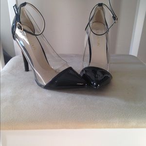 Black and clear strappy pumps