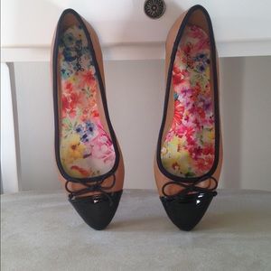 Camel and black flats