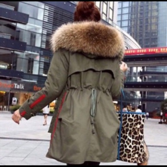 green winter jacket with fur hood