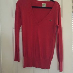 Red Lacoste V-neck sweater