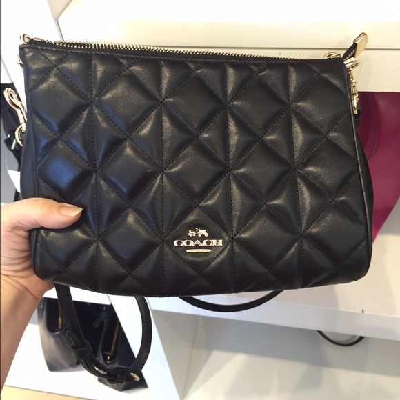 Black quilted coach cross body