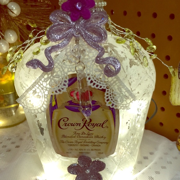 hand decorated liquor bottle, runs on AA batteries