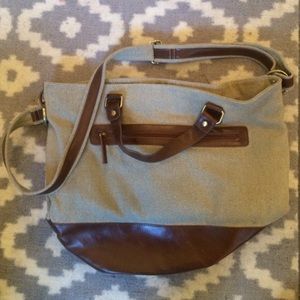 Cooperative canvas and leather tote