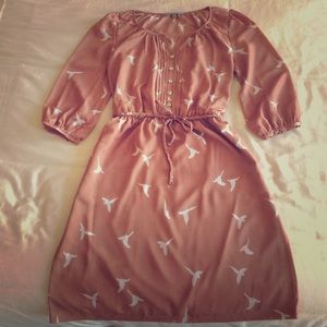 Long sleeved dress with bird pattern