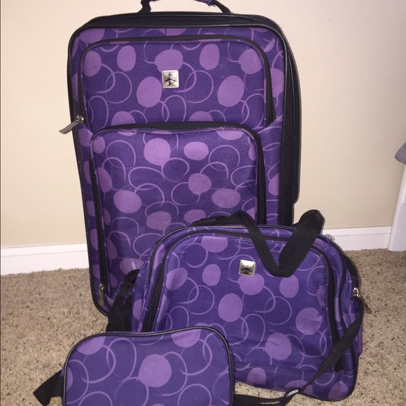 Purple suitcase set
