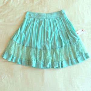 Teal mini skirt with lace detail