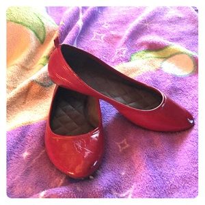 Red patent leather flats