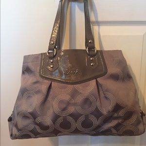 Authentic. Additional shoulder strap included.