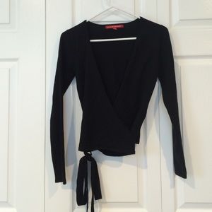 BLACK WRAP AROUND SWEATER. NEARLY NEW.