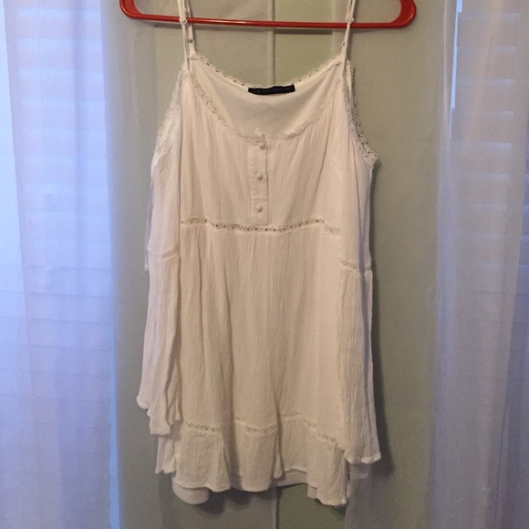 White, off-shoulder tunic
