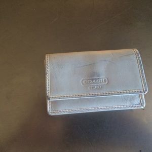 Coach white leather credit card holder.