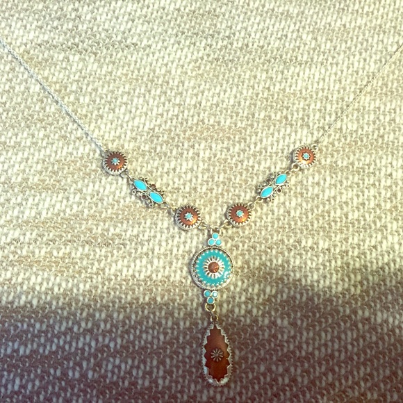 Silver necklace with turquoise and brown accents
