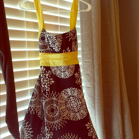 Fit & flare dress. Tulle lined for extra lift.