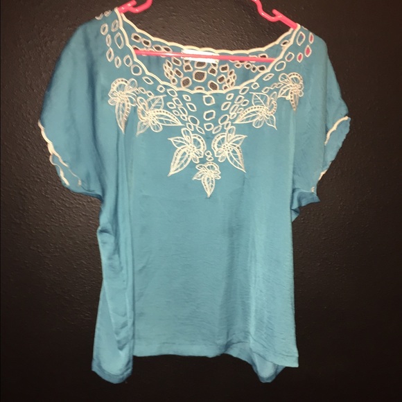 Blue and white patterned blouse