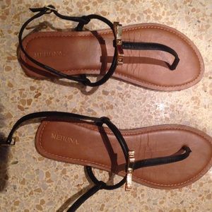 Brown and black flats