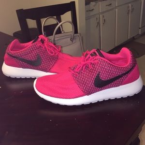 Pink Nikes. Worn once (size 7 in Men's)