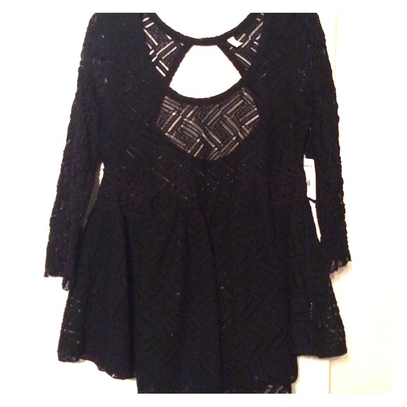 3/4 sleeve shirt from Free People. Size M.