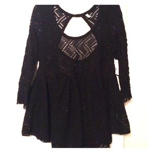 3/4 sleeve shirt from Free People. Size M.