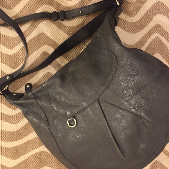 Used over the shoulder Furla bag.