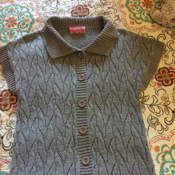 Sweet and sinful short sleeve button up sweater