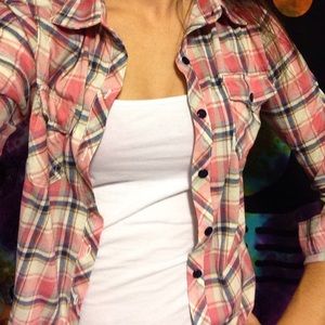 Pink flannel long sleeve shirt.